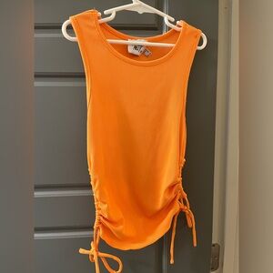 Cute orange princess polly top.